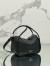Prada Top Handle Bag in Black Grained Leather