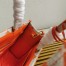 Prada Symbole Small Bag In Orange/White Jacquard Fabric